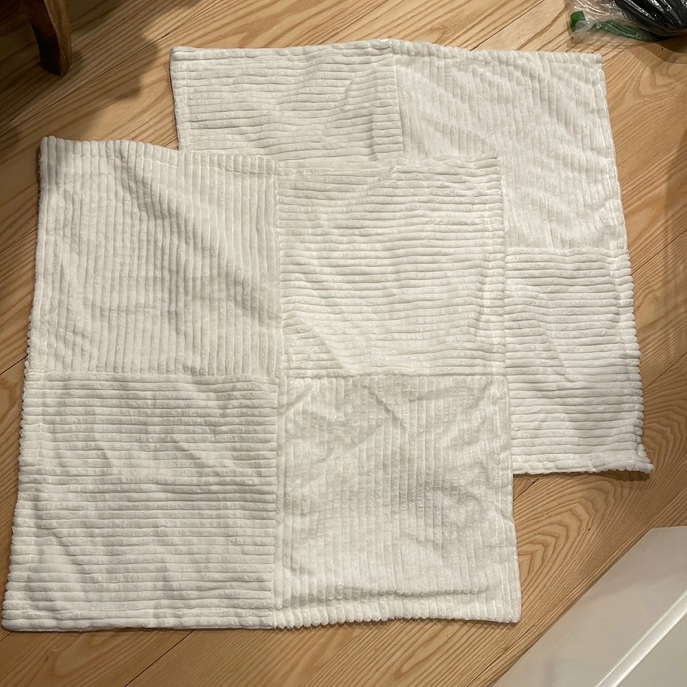 NIB  two white throw pillow covers.